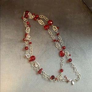 Silver chain and red beaded necklace